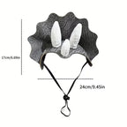 Gray Triceratops pet costume headpiece with three white horns, adjustable chin cord and 24 by 17 cm size diagram