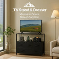 HighPeak TV Stand & Dresser in black with deep drawers and open shelves in a modern living room setting