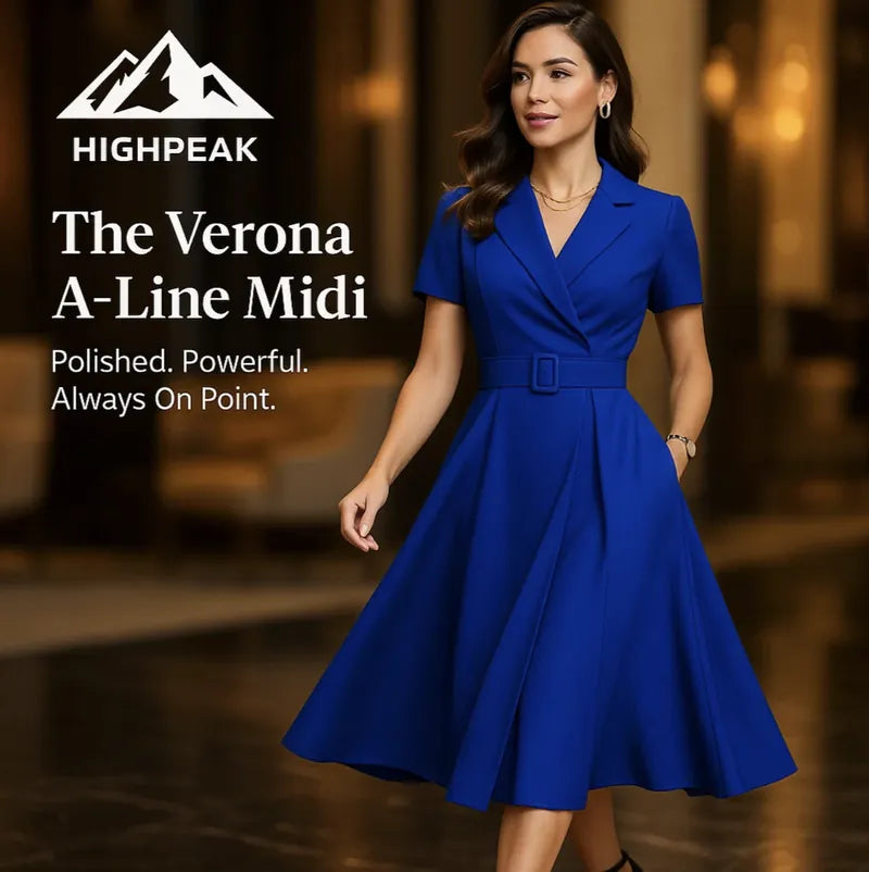 HighPeak The Verona A-Line Midi Dress in royal blue with belt and collar worn by woman in elegant indoor setting