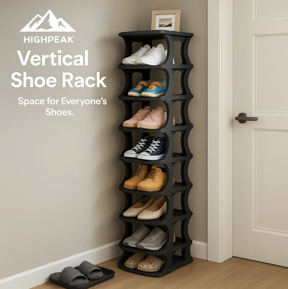 HighPeak Vertical Folding Shoe Rack in black holding various shoes in a narrow hallway corner by a white door.