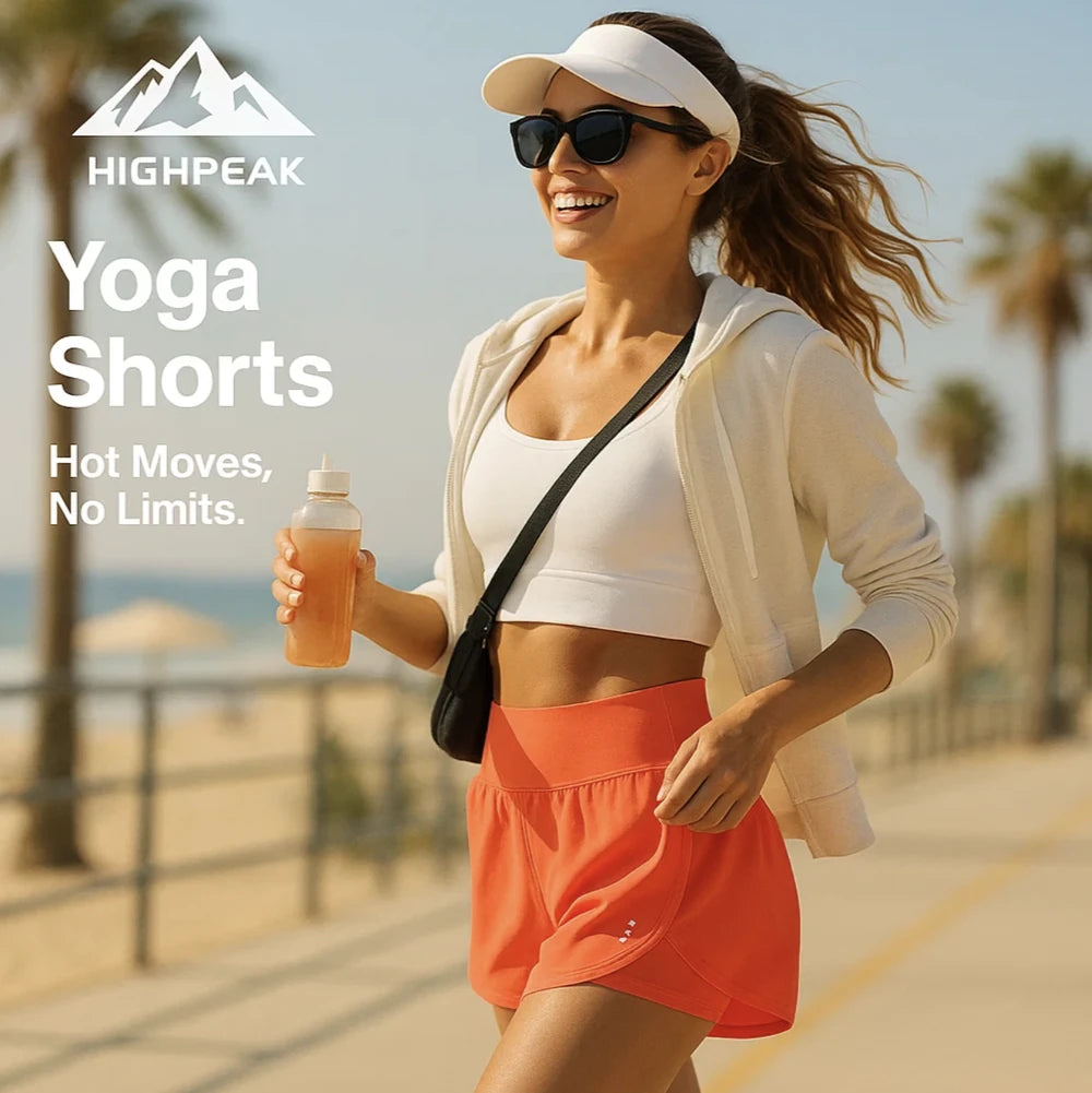 HighPeak Yoga Shorts in coral with high waist and flowy fit worn by woman walking outdoors on sunny day