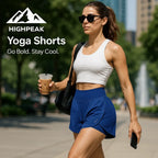 HighPeak Yoga Shorts in blue with high waist and light-reflective dots worn by woman outdoors walking confidently