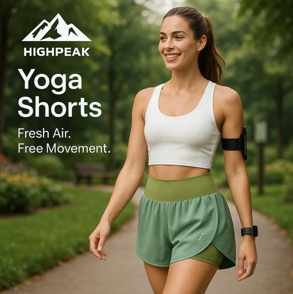 HighPeak Yoga Shorts in green with high waist and breathable fit worn by woman jogging outdoors in a park