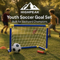 HighPeak Youth Soccer Goal Set with blue and yellow frame, ball, and pump on grass with kids playing in background