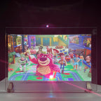 Holographic Window Projection Film glass-mounted demonstration showing colorful animated toy characters.