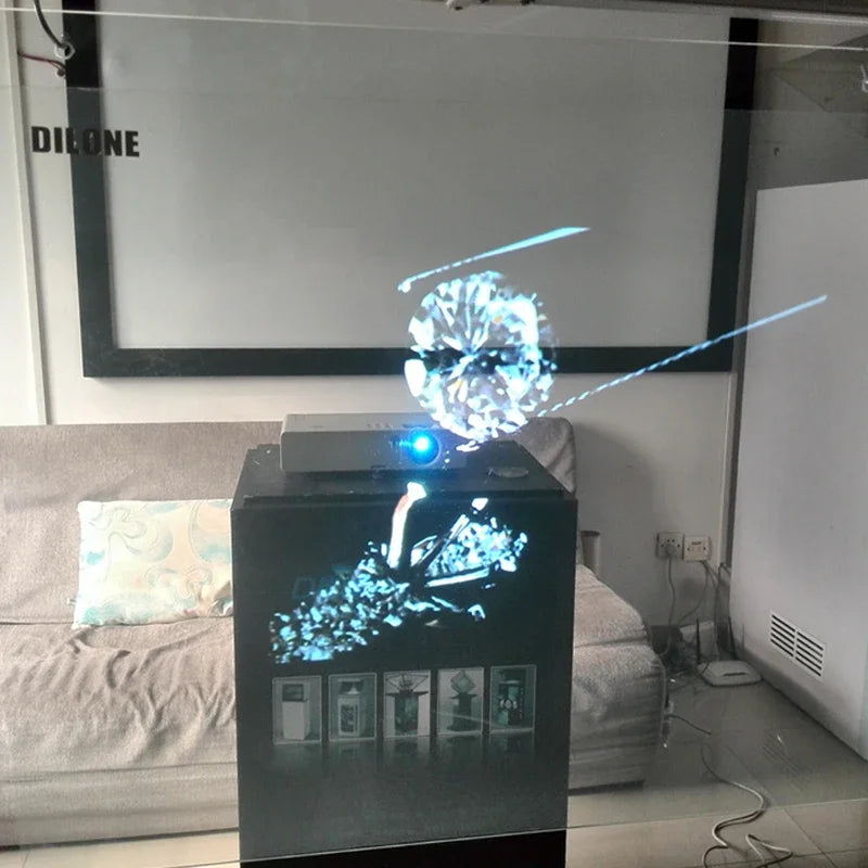 Holographic Window Projection Film with a diamond-shaped projection and projector visible behind the glass.