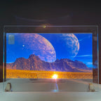 Holographic Window Projection Film glass-mounted demonstration showing planets above a rocky landscape.