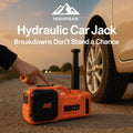 HighPeak Hydraulic Car Jack in orange lifting a white car tire on a roadside during sunset for emergency use