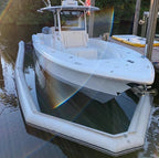 Inflatable Boat Dry Dock shown in a close front view around a center-console boat