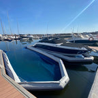 Inflatable Boat Dry Dock shown empty with a blue floor at a marina