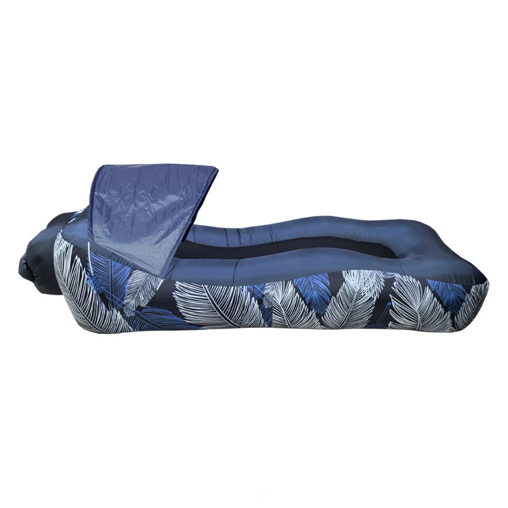 Inflatable Canopy Lounger in navy blue, side profile showing its canopy, mesh center and leaf-print sides.