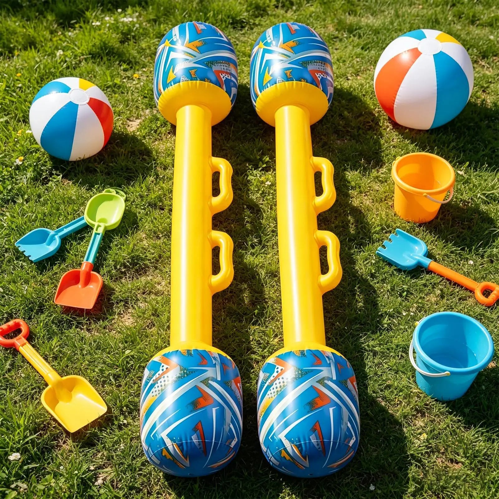 Inflatable Gladiator Baton Set — two batons on grass surrounded by beach toys