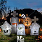 Inflatable Graveyard Set glowing on a front lawn at dusk with five tombstones and a grim reaper