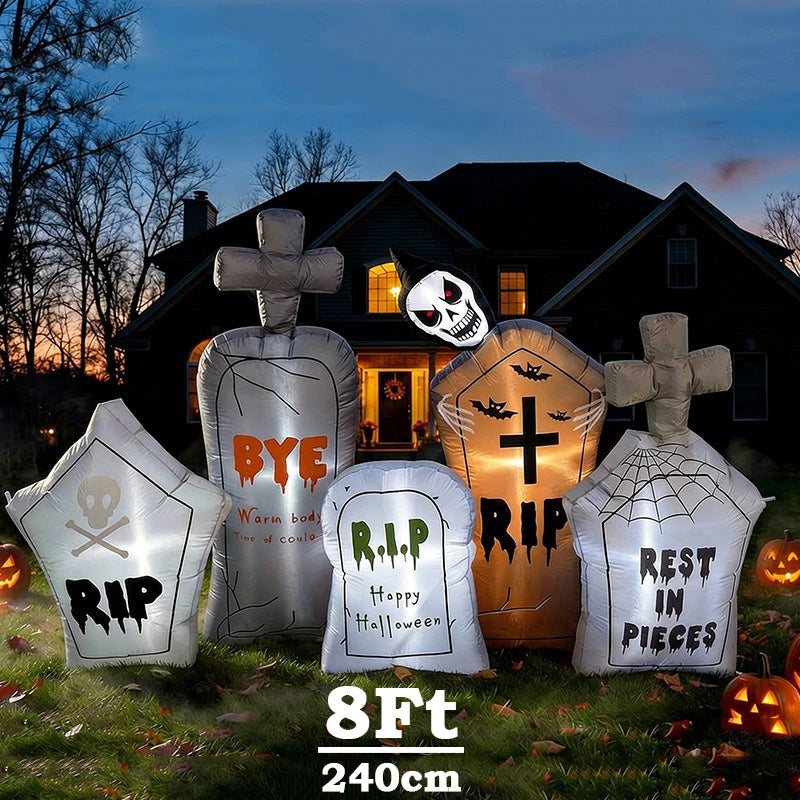 Inflatable Graveyard Set glowing on a front lawn at dusk with five tombstones and a grim reaper
