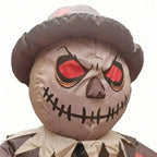 Inflatable Scarecrow Costume face close-up showing printed red eyes, a stitched smile, and a wide-brim hat.
