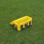 Inflatable Treasure Chest Cooler opened on a grassy lawn for an outdoor party setup