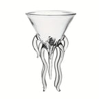 Jellyfish Cocktail Glass in clear glass with a martini-style bowl and sculpted tentacle base on white.