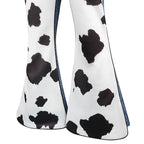 Kids Cowgirl Costume close-up of the cow-print flared pants and blue side trim