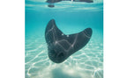 Kids Mermaid Swim Fin underwater in a wide layout, showing the black blade and foot openings above the pool floor.