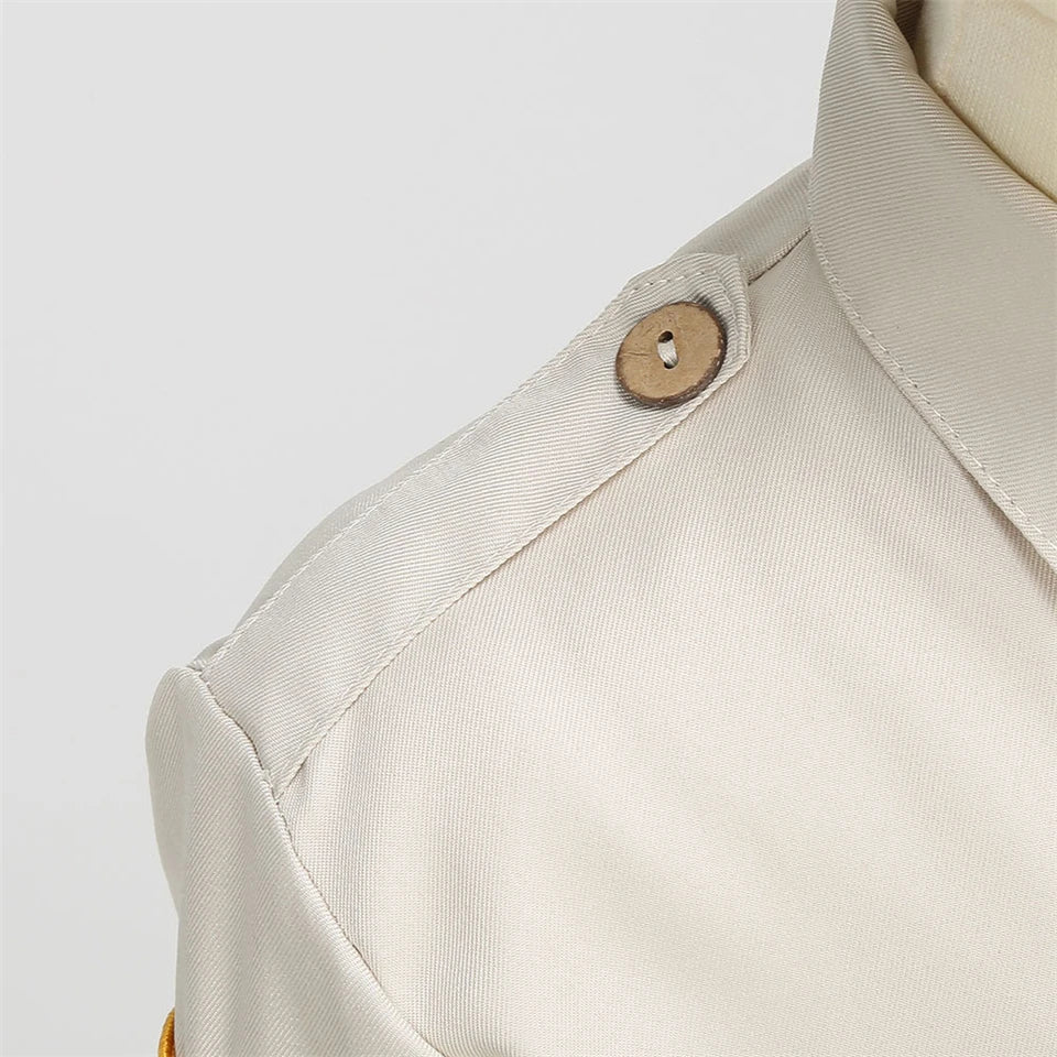 Kids Police Costume Set close-up of a beige shoulder tab, button, collar edge, and stitching.