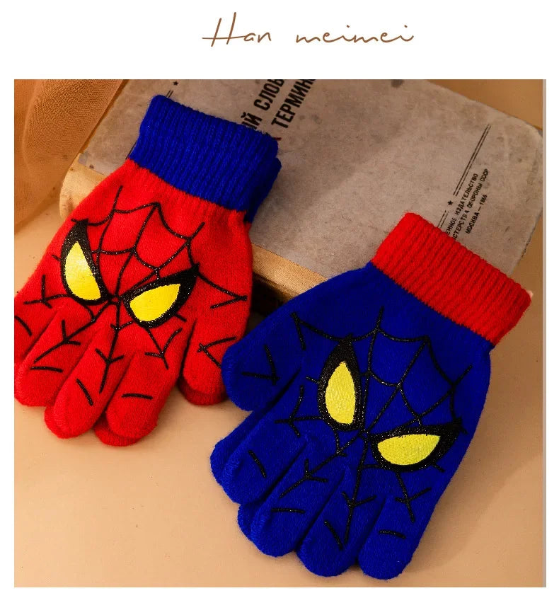 One red and one blue kids spider web glove shown together with contrasting ribbed cuffs.