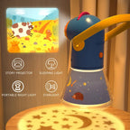 Kids Story Projector Lantern projecting a gingerbread scene on a wall and a moon-and-star pattern below.