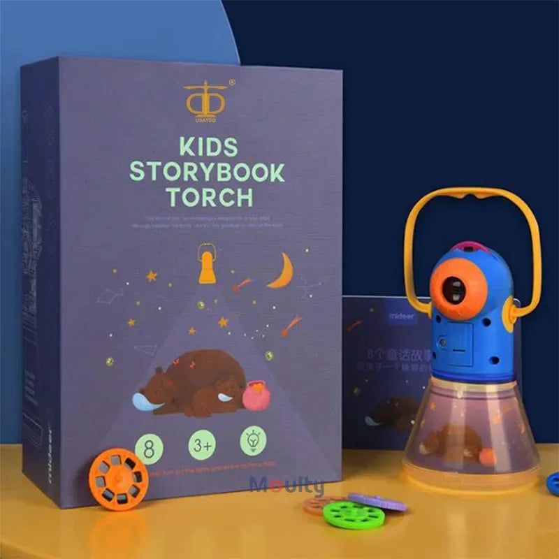 Kids Story Projector Lantern glowing beside its purple box and colorful story discs on a yellow surface.