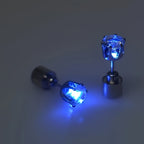 LED Color Changing Earrings pair illuminated in blue with crown-shaped studs and battery bases visible