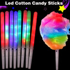 LED Cotton Candy Sticks in assorted light colors beside rainbow-lit cotton candy against a black background.