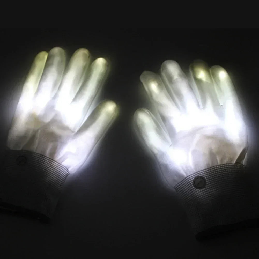 LED Glowing Skeleton Gloves white-lit pair laid flat on a dark surface, with the cuff buttons visible.