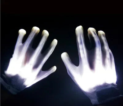 LED Glowing Skeleton Gloves with white illumination, shown on two hands with fingers spread in the dark.