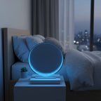 Ice-blue LED Infinity Tunnel Mirror on a bedside table beside a small plant, with a bed and city lights behind.