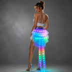 LED Light-Up Tutu Skirt with a sparkling purple waistband and multicolored LEDs shown on a model.