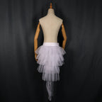 LED Light-Up Tutu Skirt with the lights off, showing white layered tulle and the long back on a mannequin.