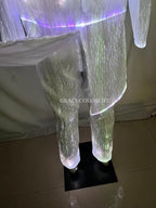 LED Light-Up Tuxedo close-up of white illuminated pants beneath the lifted jacket tail