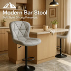 HighPeak Modern Bar Stool in gray faux leather with padded seat and adjustable height, shown in bright modern kitchen.