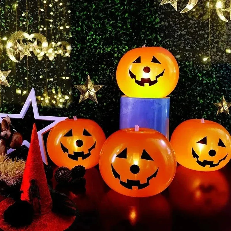 Luminous Halloween Balloons arranged as four glowing pumpkins in a styled Halloween party scene