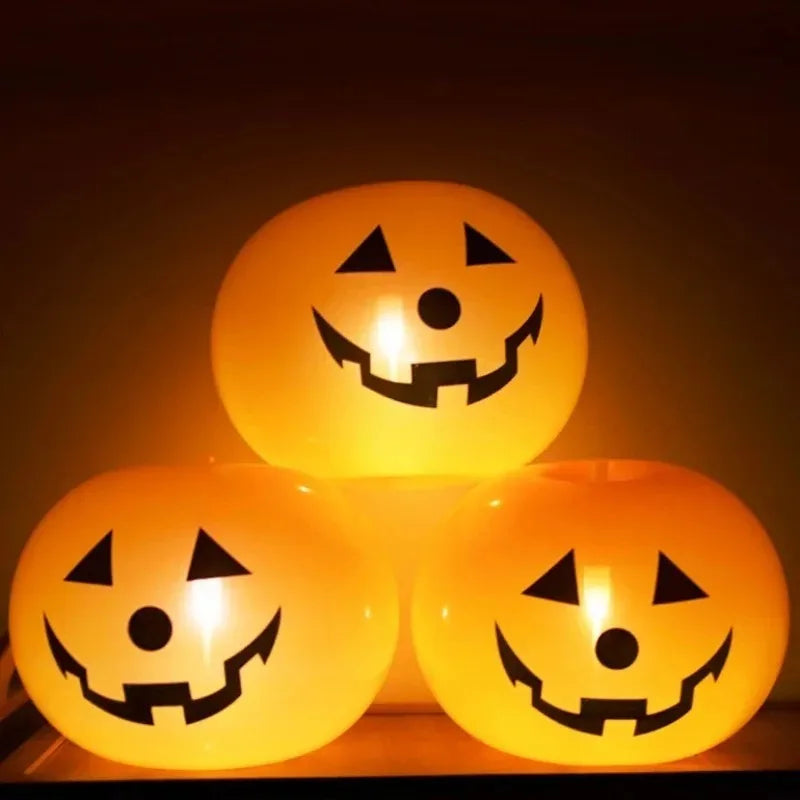 Luminous Halloween Balloons three glowing orange jack-o’-lantern balloons stacked together