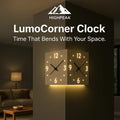 HighPeak LumoCorner Clock glowing softly in a dim room corner with dual faces and ambient backlight lighting.