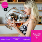 Mega Sized Wine Glass 12 L held by a woman, with capacity and rim, base, and height measurements.