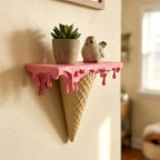 Melting Ice Cream Shelf in Pink styled with a plant and bird figurine in a warm room
