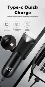 Men’s Groin Trimmer connected to a laptop by Type-C cable with its digital battery display illuminated