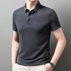 Man wearing the gray Men's Valor Textured Polo in a side pose