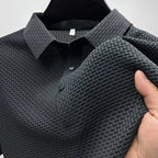 Gray Men's Valor Textured Polo close-up showing textured knit
