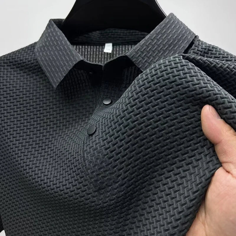 Gray Men's Valor Textured Polo close-up showing textured knit
