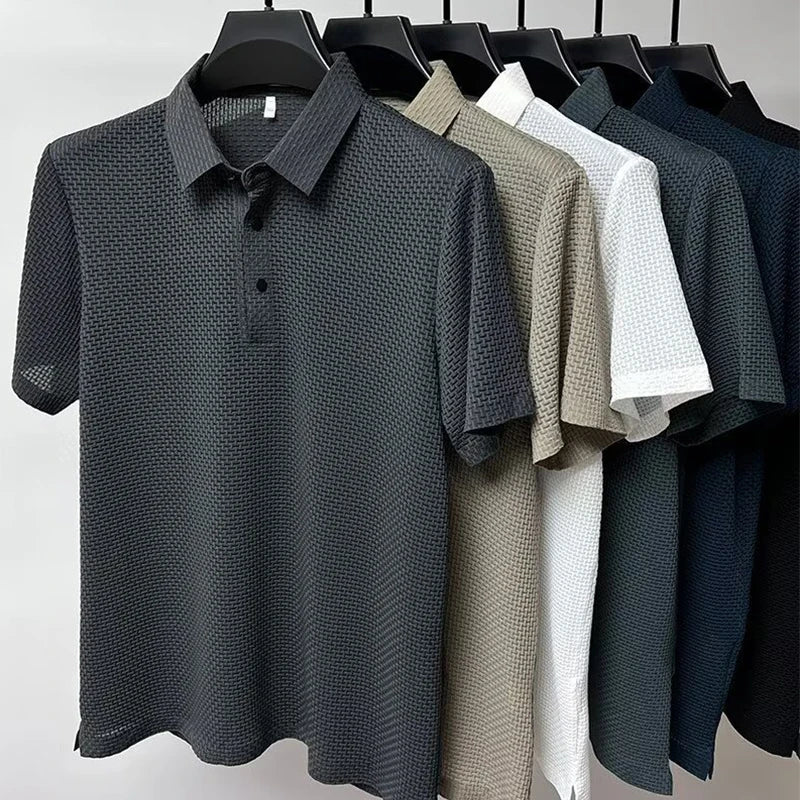 Men's Valor Textured Polo hanging lineup in six solid colors