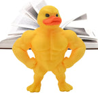 Close-up front view of yellow muscular duck desk statue