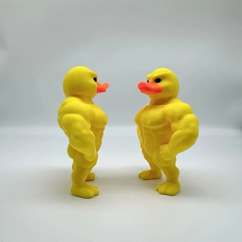 Two Mini Buff Duck Figurines shown from side angles