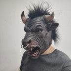 Minotaur Costume Mask worn at a three-quarter angle, showing the snout, nose ring, fangs and sculpted cheek.
