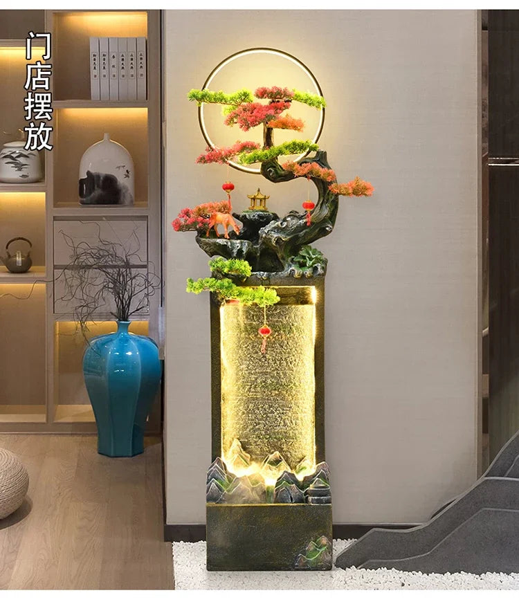 Moonlit Bonsai Waterfall against a pale wall near display shelves, a blue vase and a dark sculptural seat.
